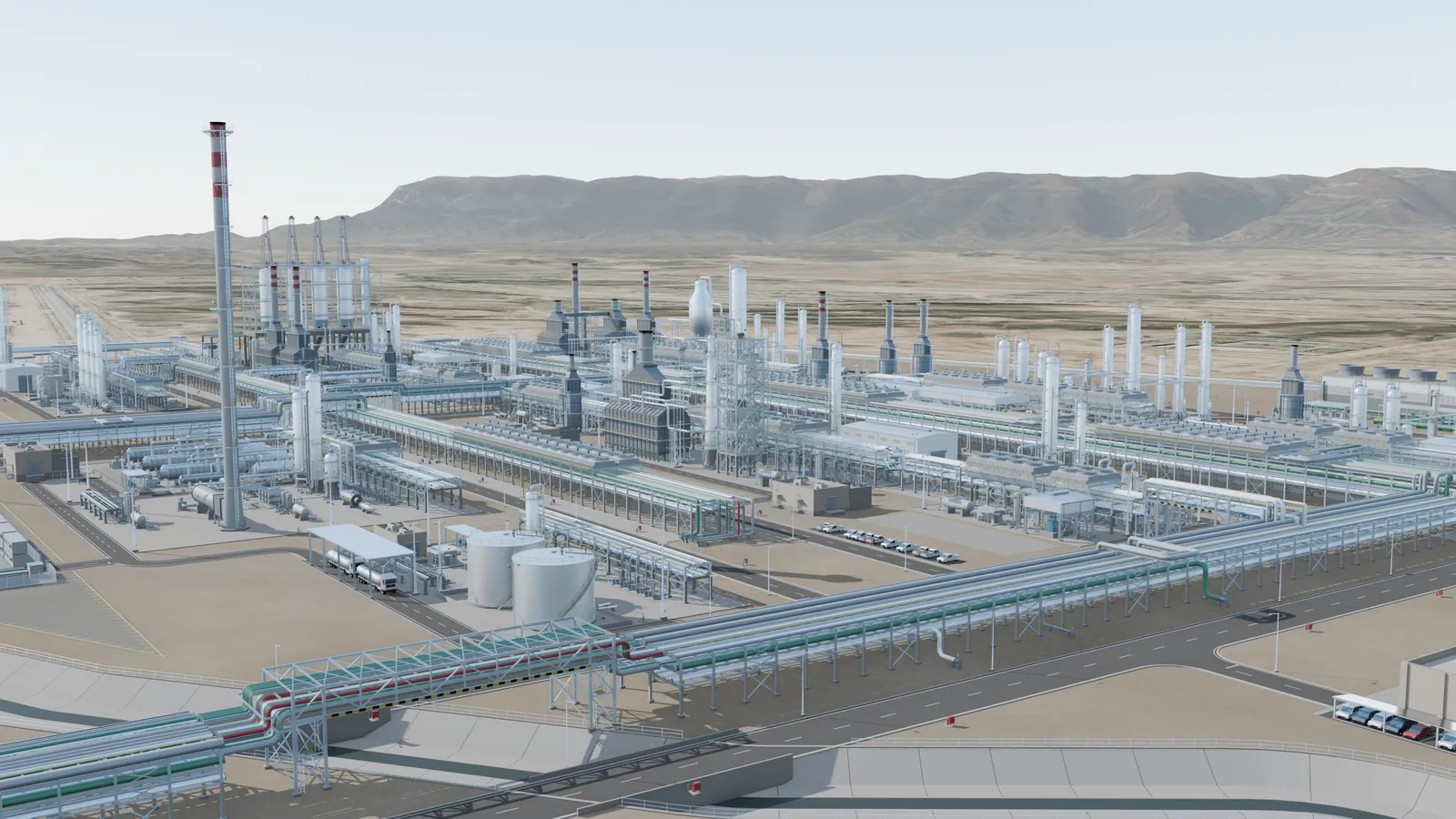 Low aerial view of refinery process units and a tall stack, with mountains behind